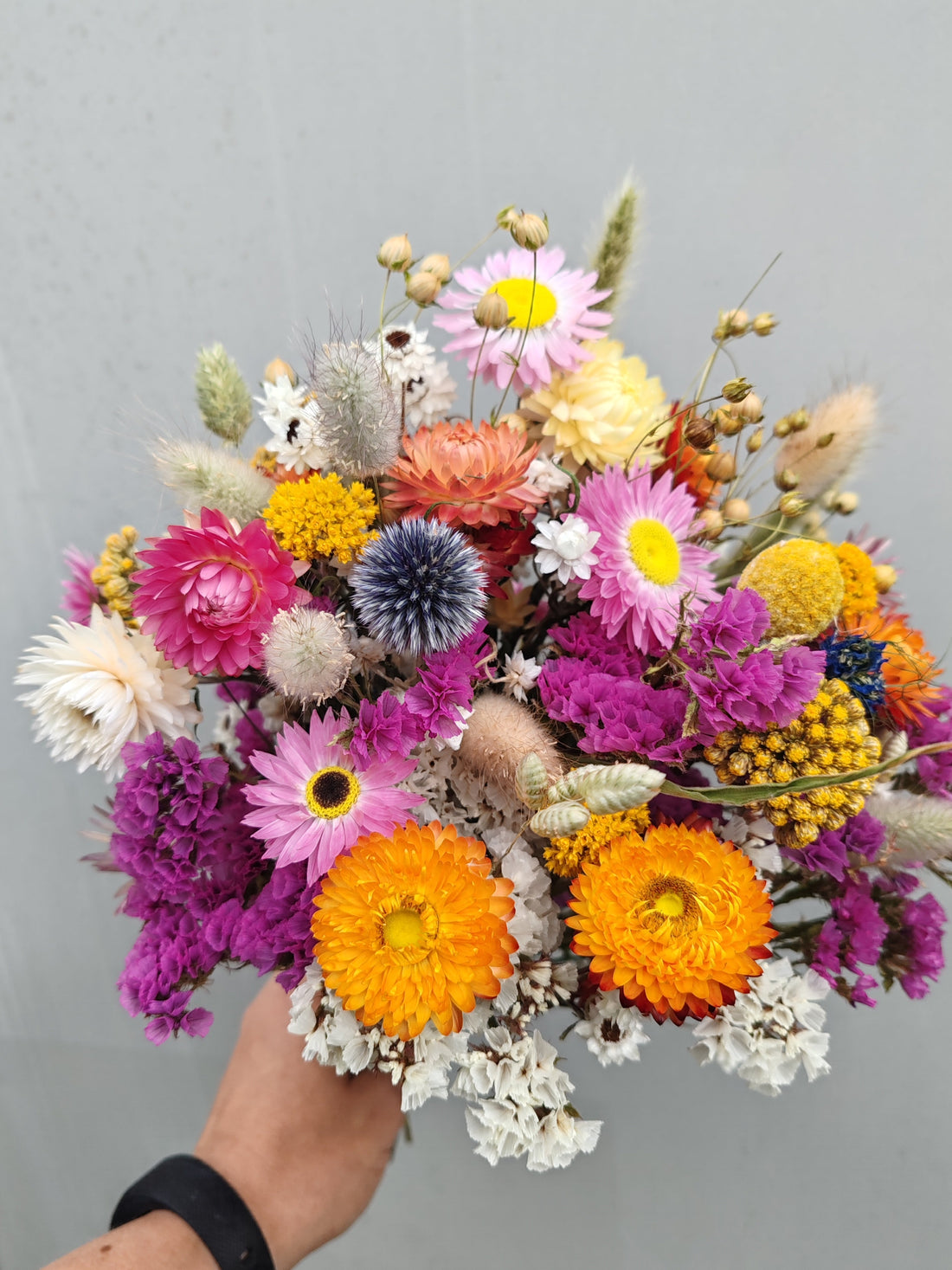 Colourful bright dried flower wedding bouquet