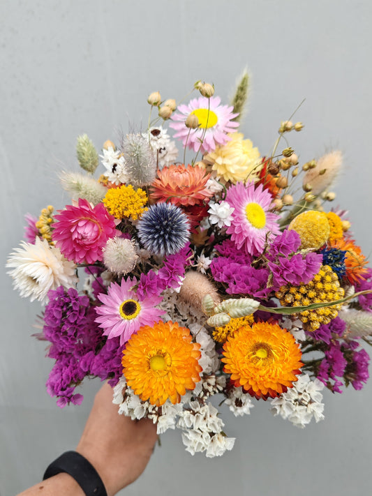 Colourful bright dried flower wedding bouquet