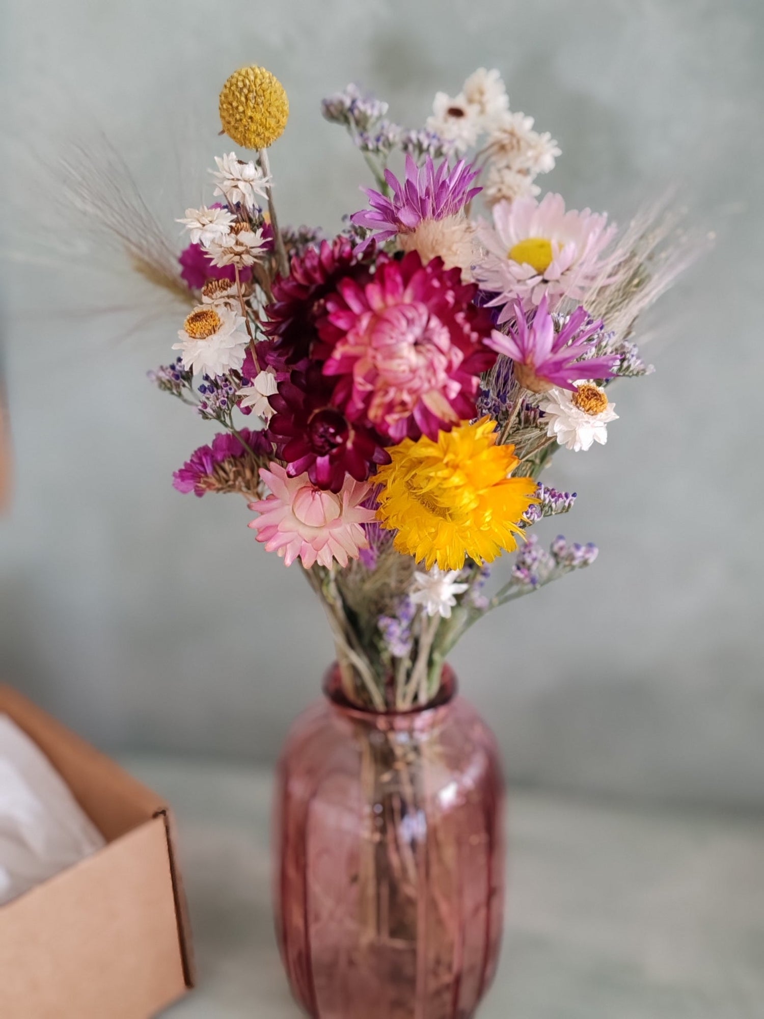 Dried flowers in bud vase