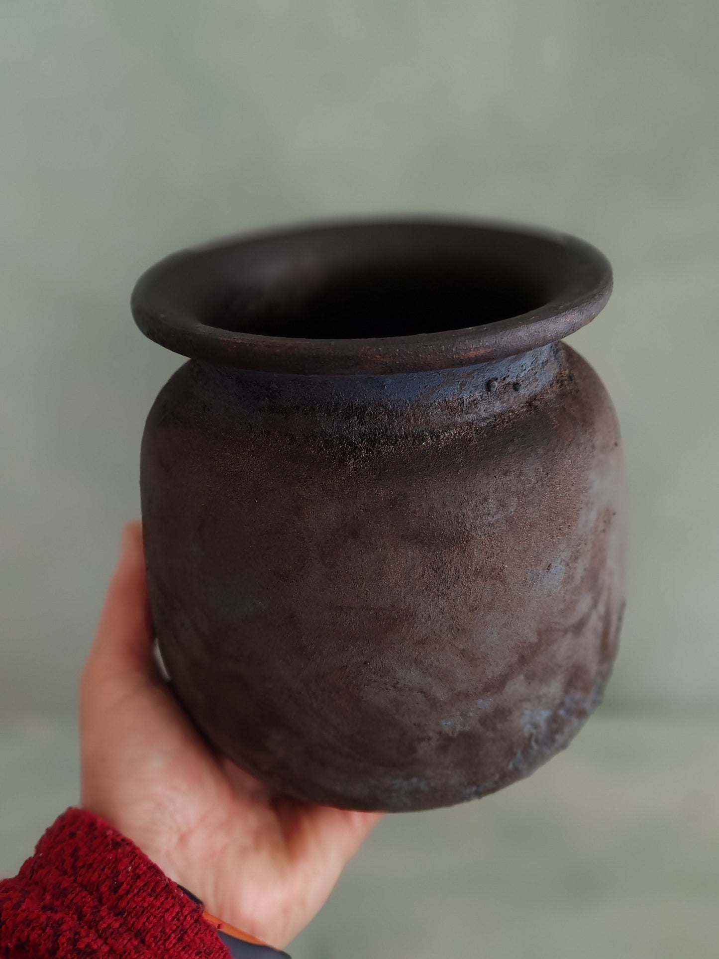 Rustic vase empty suitable for dried flowers in blue black shades with texture